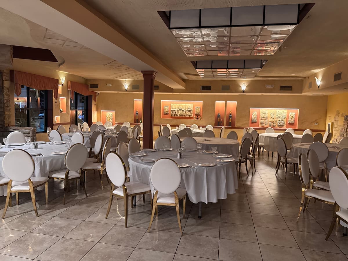 Banquet hall with round tables set for a private event